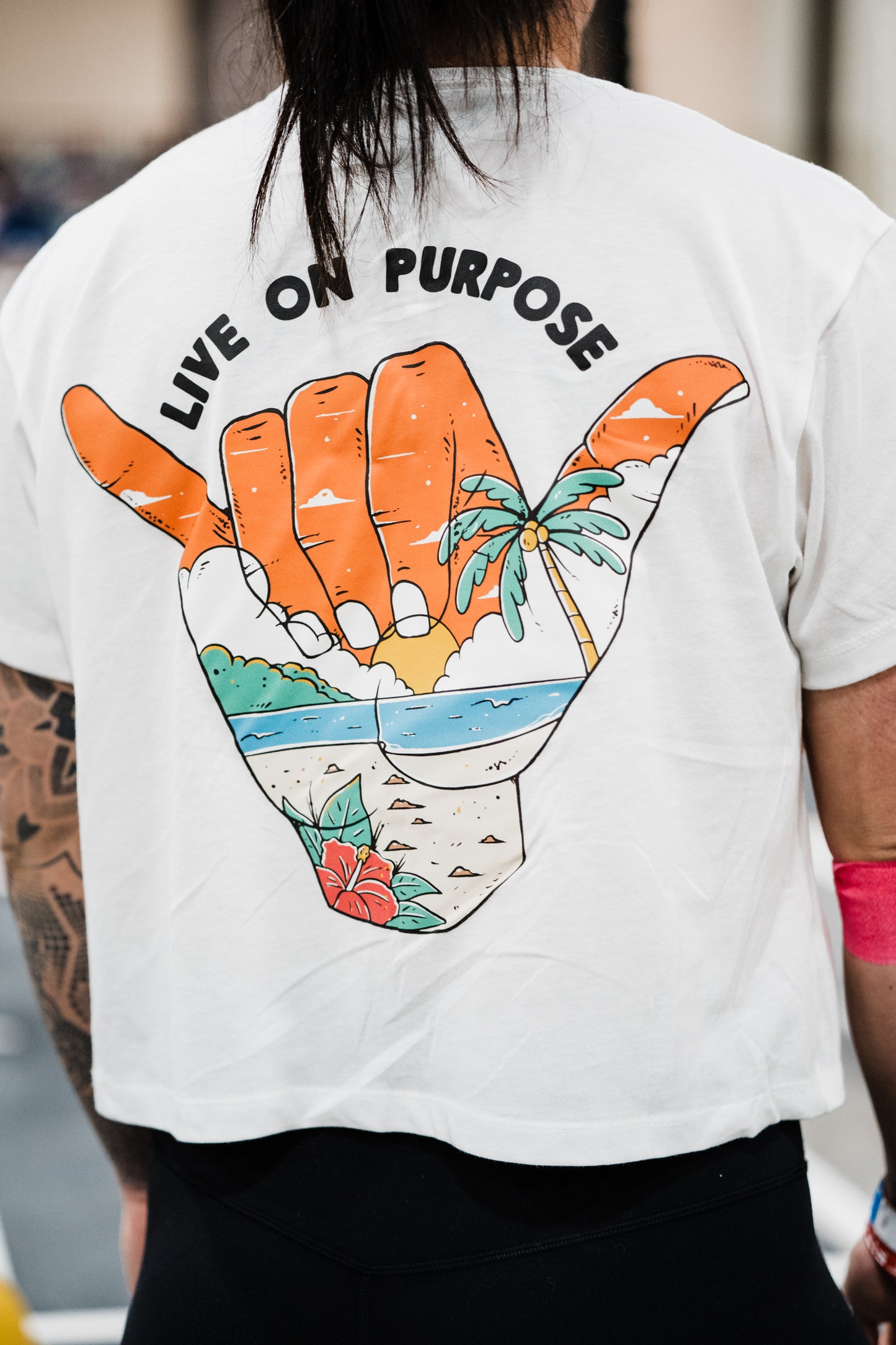 LIVE ON PURPOSE HAND CROP