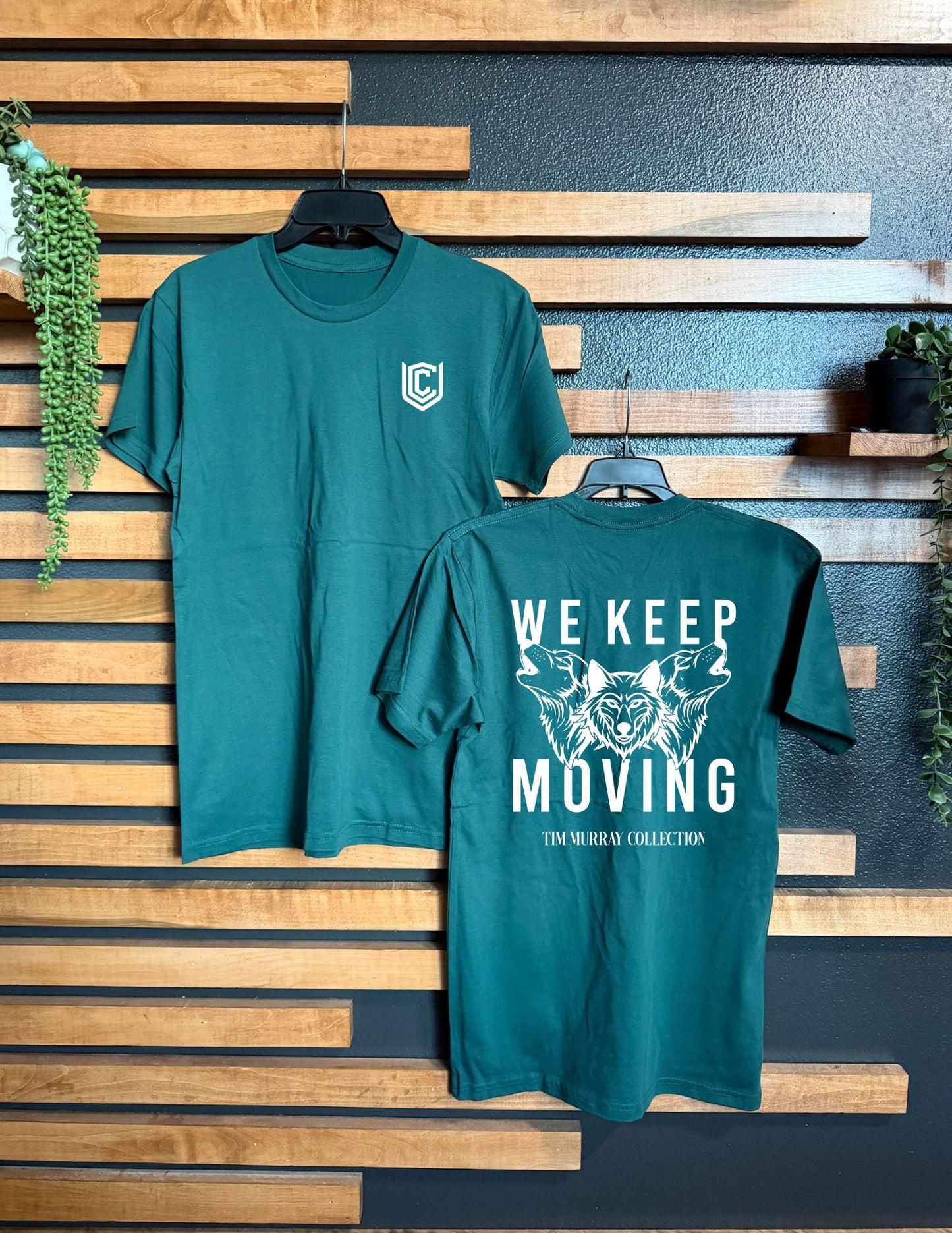 WE KEEP MOVING UNISEX TEE