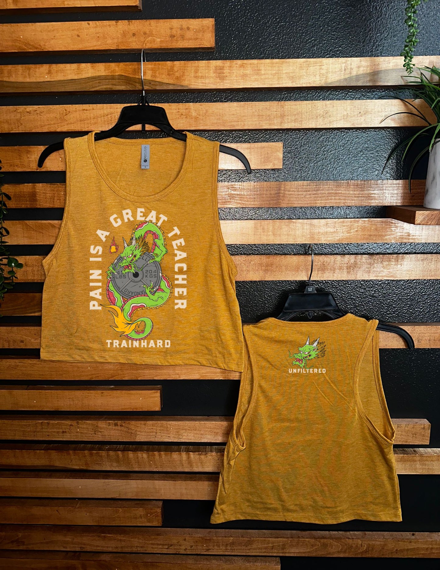 PAIN IS A GREAT TEACHER CROP TANK